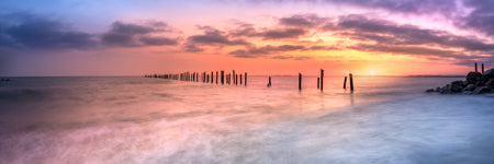 A colourful sunrise at old bridport pier tasmania, Australia. Panoramic photograph, Shaun Trainer photography. Purchase fine art landscape photography prints. Luxury Interior design ideas.