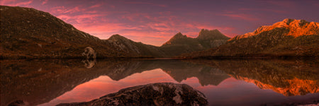 Sunrise light hits the mountain face at cradle mountain, dove lake, tasmania, Australia. Panoramic photograph, Shaun Trainer photography. Purchase fine art landscape photography prints. Luxury Interior design ideas.