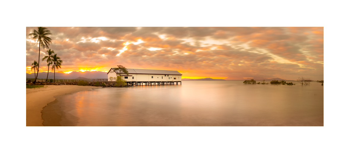 Beautiful sunset at the Old Sugar Wharf. Port Douglas, Queensland Australia. Panoramic photograph, Shaun Trainer photography. Purchase fine art landscape photography prints. Luxury Interior design ideas.