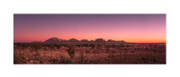 Limited edition print. Sunrise creates amazing colors in the sky and casts beautiful light across the red rock faces of kata tjuta, the olgas. Uluru Northern Territory Outback, Australia. Panoramic photograph, Shaun Trainer photography. Purchase fine art landscape photography prints. Luxury Interior design ideas.