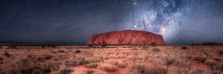 Uluru at night. The milky way stars above uluru ayers rock. kata tjuta, the red heart of australia. Outback Northern Territory, Australia. Panoramic photograph, Shaun Trainer photography. Purchase fine art landscape photography prints. Luxury Interior design ideas.